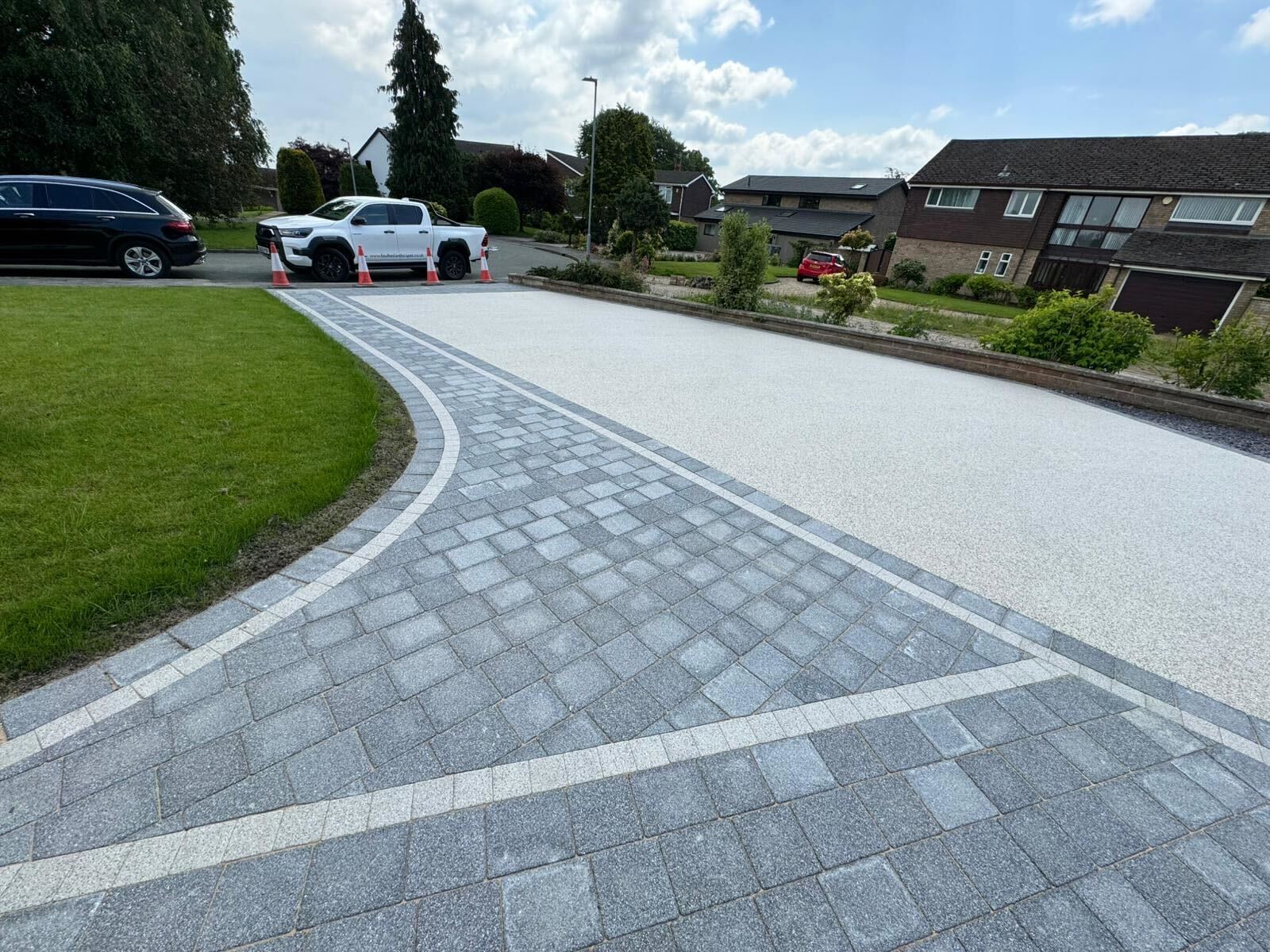 
    A well-designed driveway plays a key role in making a lasting first impression of your Wrexham property. At Foulkes Paving, we specialise in the expert planning, installation, and maintenance of driveways, offering a variety of styles and materials, such as:


    Block Paving
    Resin Bound Stone
    Tarmacadam
    Stabilised Gravel


    Let us transform your driveway today!

