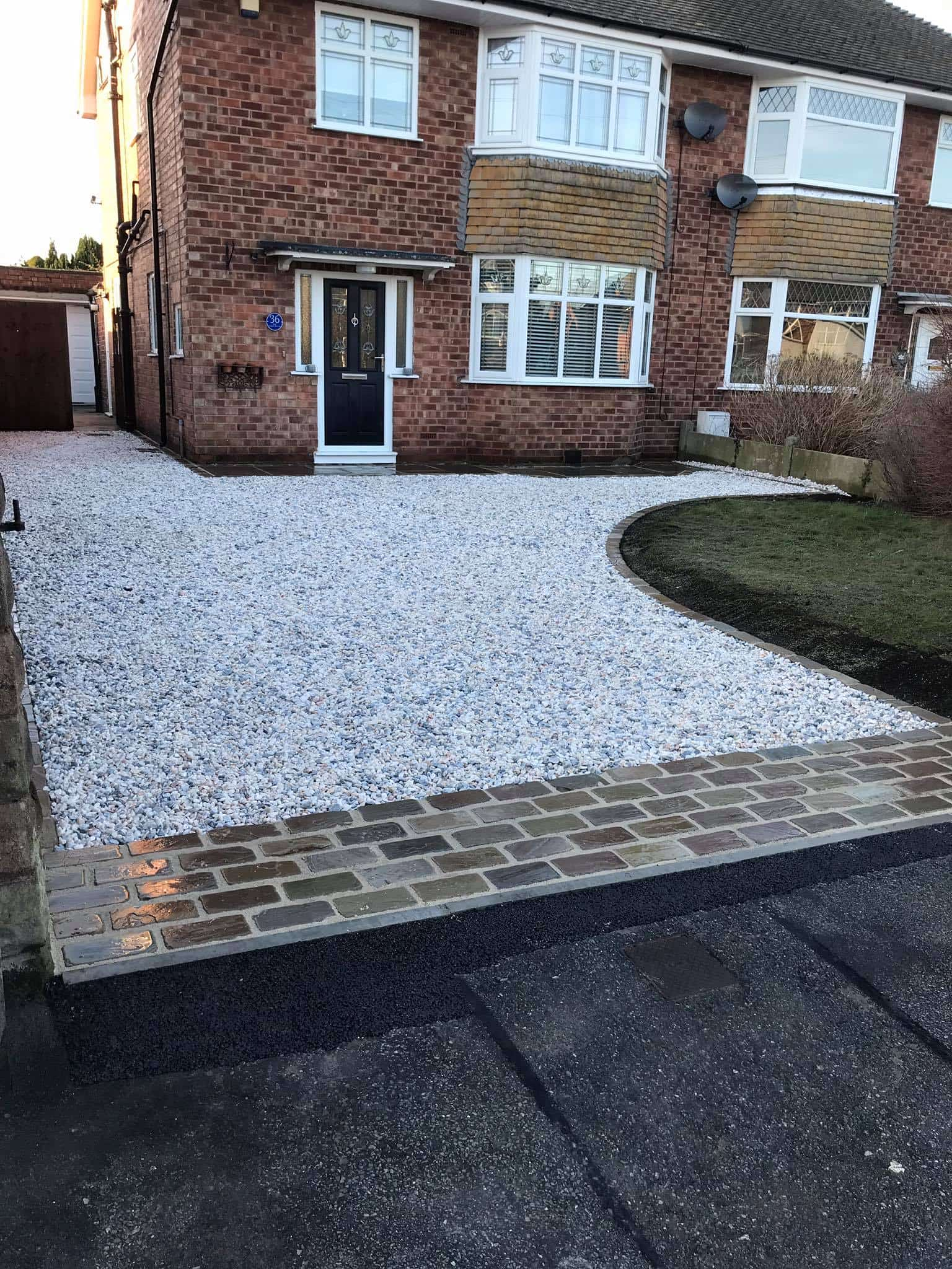 Stabilised gravel driveways are a very cost effective option for any driveway - using the correct installation method and grid choice they are a very hard wearing and completely permeable option that costs a fraction of other surfaces.
These driveways are ideal for budget driveways, if a large area needs to be covered or even to break up a driveway design in conjunction with another materials such as block paving.